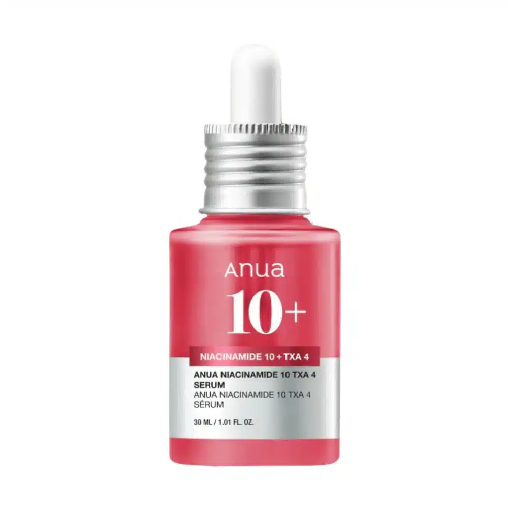 A sleek glass bottle of Anua Niacinamide 10% + TXA 4% Serum (30ml) with a minimalist design, featuring a dropper applicator and a clean white label displaying the product's name and key details, placed on a neutral background.
