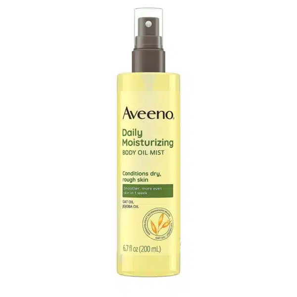 Front view of a 200 ml Aveeno Daily Moisturizing Body Oil Mist with Oat Oil spray bottle on a white background, showing beige-green label, clear pump nozzle, and claim of 98 % naturally derived ingredients.