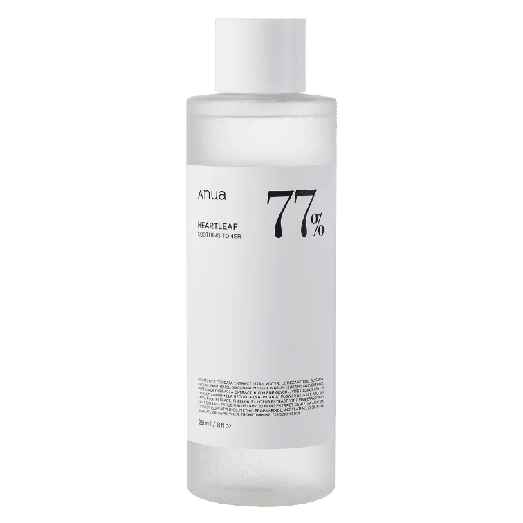 Clear glass bottle of ANUA Heartleaf 77% Soothing Toner (250ml) on white background, filled with transparent liquid. Label highlights “77% Heartleaf Extract” and “For Sensitive Skin.” Ideal for acne-prone or irritated skin in tropical climates—reduces redness, balances oil, and preps for flawless hydration.