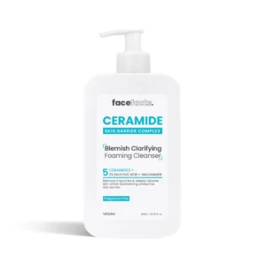 Front‑facing image of a 400 ml white bottle of Face Facts Ceramide Blemish Clarifying Foaming Cleanser with teal and silver labeling, pump dispenser, and clear cap, photographed on a bright white background to highlight the product’s clean, clinical design.