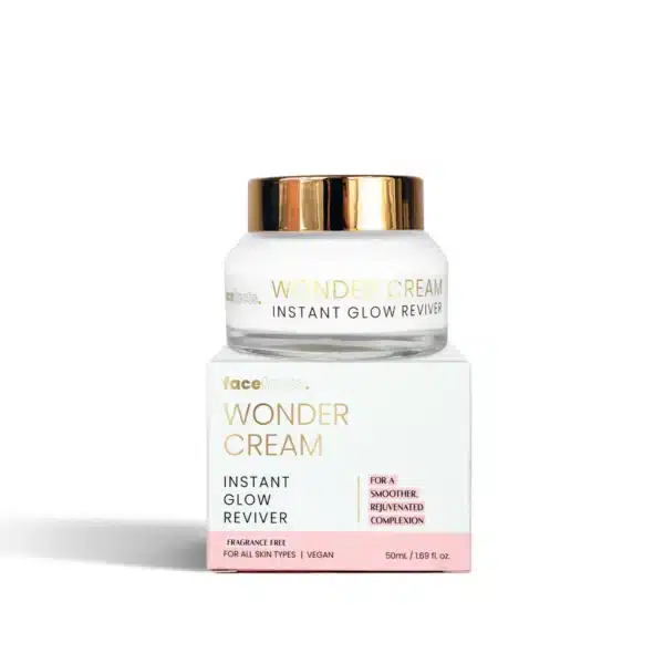 Close‑up of a 50 ml jar of Face Facts Wonder Cream Fragrance Free on a pure white background—sleek white tub with a satin‑silver lid, minimal black text, showcasing its clean, fragrance‑free, vegan moisturiser identity for hydrating and brightening all skin types.
