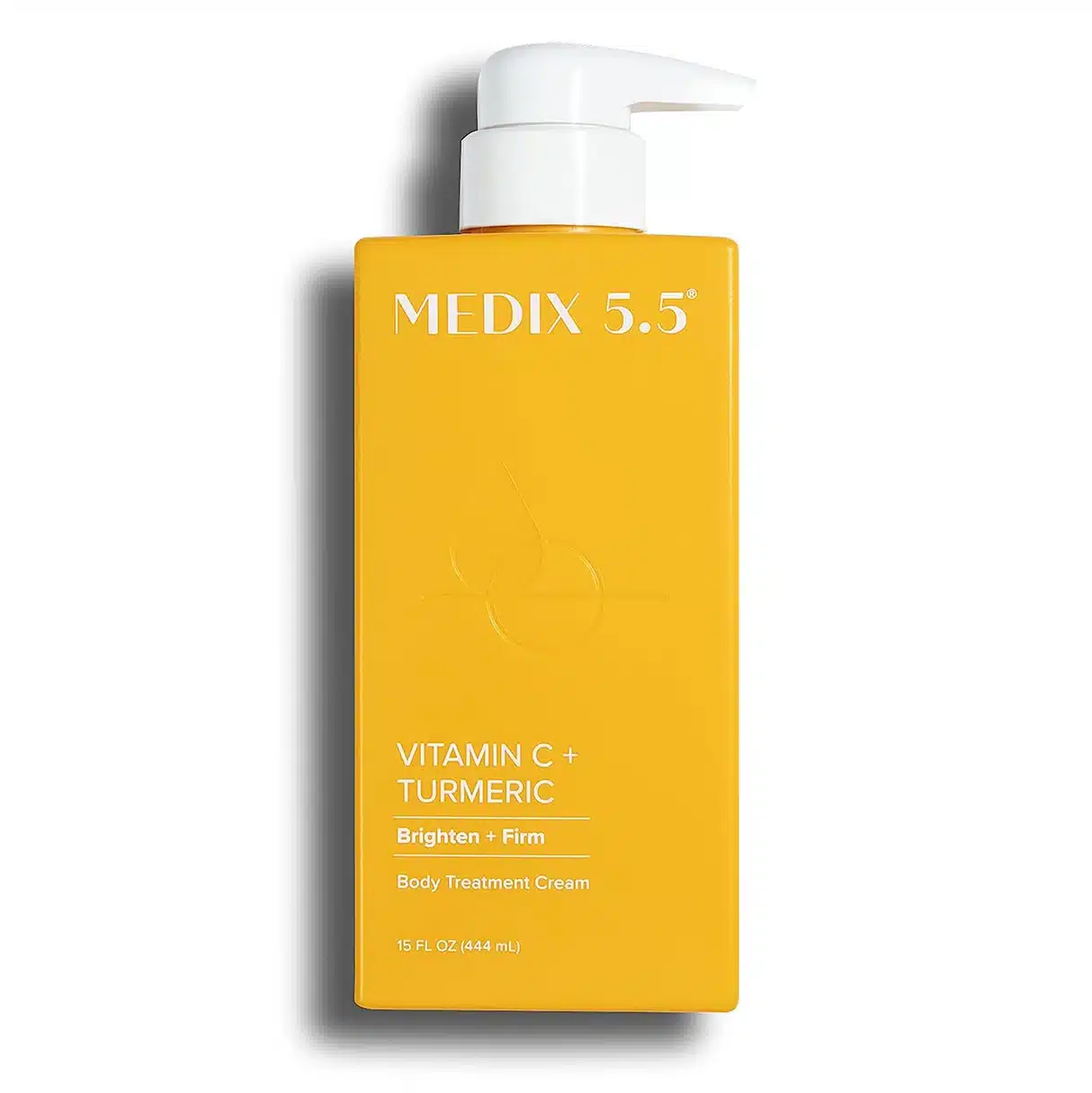 Front-facing photo of a 15 fl oz (444 ml) white bottle of MEDIX 5.5 Vitamin C + Turmeric Body Treatment Cream on a pure white background; the golden label highlights vitamin C and turmeric, while a green “pH 5.5” badge emphasises skin-balanced hydration.