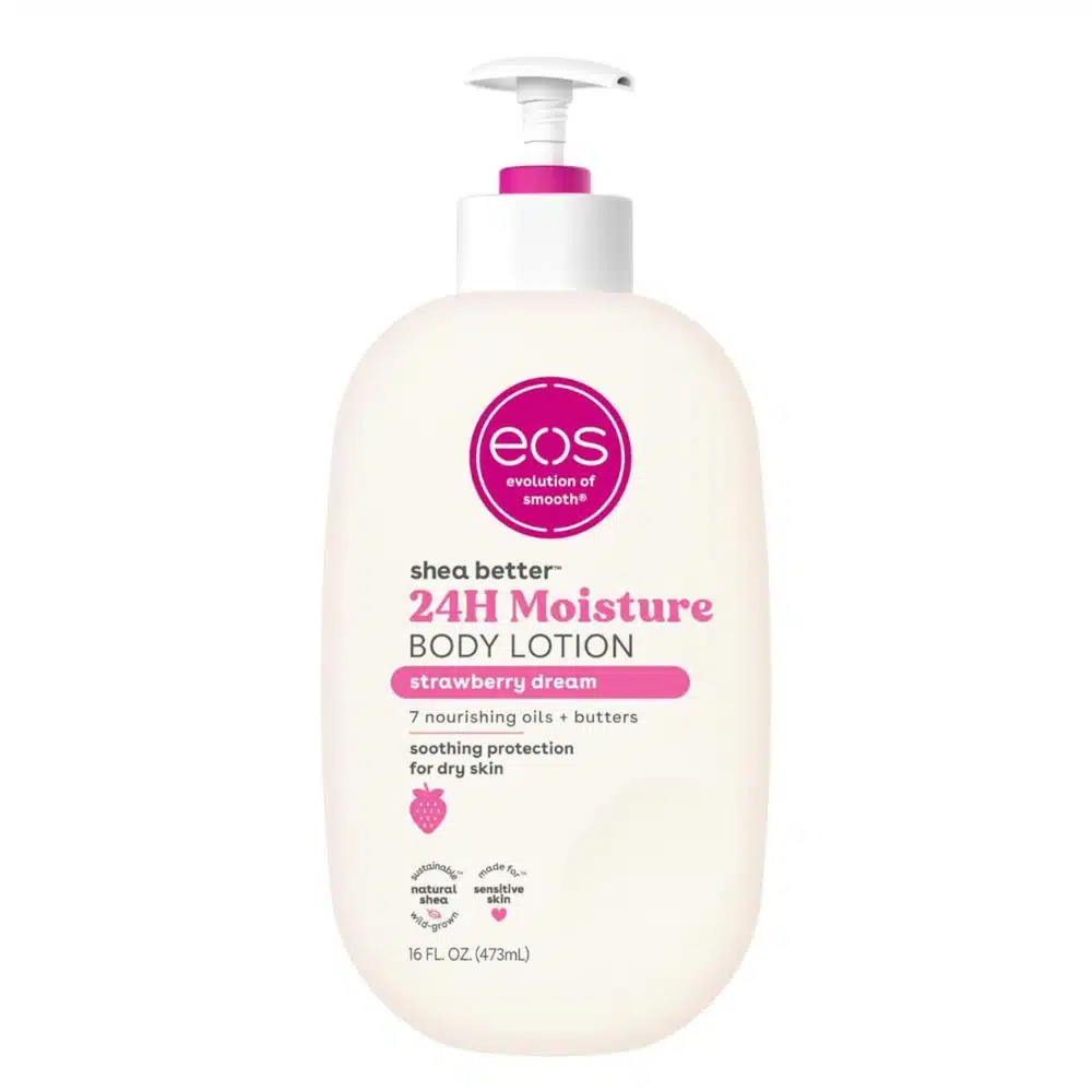 Front view of a 16 oz bottle of EOS Shea Better 24H Moisture Body Lotion in Strawberry Dream scent, standing on a white background—pink-label packaging with strawberry graphics, highlighting vegan, cruelty-free, 24-hour hydration benefits and Pure Skincare Ghana authenticity.