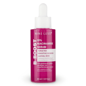 Front-facing photo of a 30 ml glass dropper bottle labeled “Nineless B-Boost 10% Niacinamide Serum,” standing upright on a pure white background; the clear, watery serum inside reflects light, emphasizing its lightweight texture and premium, minimalist Korean skincare design.