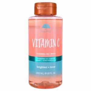 Clear bottle of Tree Hut Vitamin C Foaming Gel Wash (18 fl oz) standing upright on a white background; label features orange-yellow accents and citrus imagery, showcasing the brightening, vitamin C-infused body wash for radiant, hydrated skin.