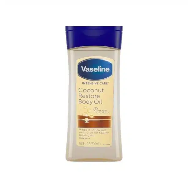 200 ml bottle of Vaseline Coconut Restore Body Oil standing upright on a pure white background; clear gel-oil formula visible through the bottle with tropical coconut imagery and Vaseline blue logo, highlighting quick-absorbing, restorative body care available at Pure Skincare Ghana.